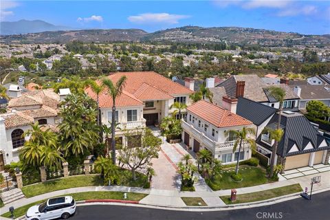 Photo of 12 Rocky Point Road, Corona Del Mar, CA 92625 (MLS # OC25163200)