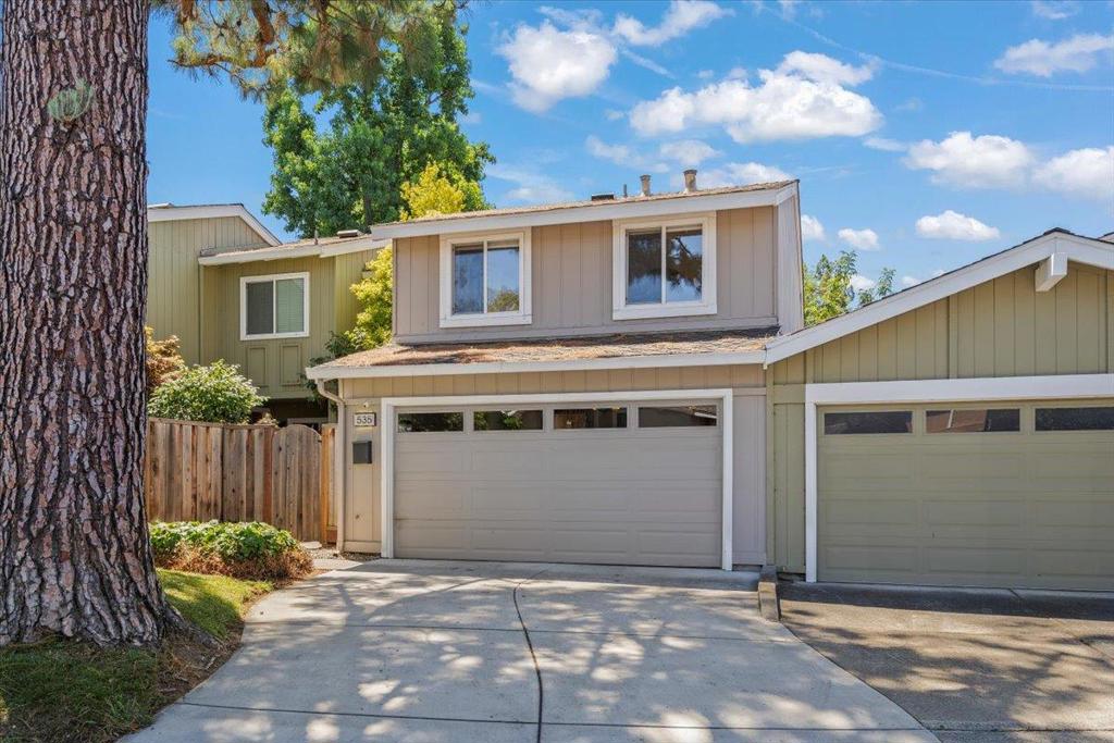 Welcome to Los Gatos Woods where contemporary comfort meets serene surroundings. This beautifully updated townhome is nestled in a quiet, tree-lined community with a gated courtyard and easy commute access. Stylish kitchen - two-tone European cabinetry, solid surface counters, gas range, double door oven, and hardwood floors. The open-concept dining area boasts refinished hardwood and flows seamlessly to a spacious patio ideal for entertaining. Living room with vaulted ceilings, a fireplace flanked by windows, and a media/game closet. Modern powder room with floating vanity. Upstairs, the primary suite offers vaulted ceilings, double closets, and an ensuite bath with oversized soaking tub, bidet, and floating vanity. Two additional bedrooms include hardwood floors and mirrored closets. Other highlights: updated baths each with wall mounted bidet toilet, in-unit laundry, 2-car garage, fresh paint, new carpet, dual-pane windows, central A/C, and a private back gate to lush walking paths. Los Gatos Woods offers resort-style living with two pools, tennis, basketball, and volleyball courts, a gym, playground, and clubhouse. Ideally located near award-winning schools. Minutes from vibrant downtown Los Gatos and Netflix campus. Easy access to Hwy 85 & 17, La Rinconada, and Vasona Park.