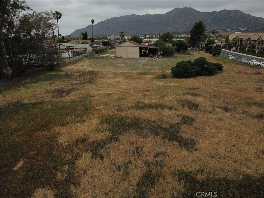 $500,000 price drop 11/21/2025 2.69 acres, Apn 26-112-008, zoned commerical, and with proper effort can get special use permit, Property has a 6 bed room 3 bath house on it per tax rolls. Valued as of 3/10/25 $3,783,700 to $5,632,900 per tax rolls. 182' frontage on Ecalyptus, 632' deep. According to Moreno Valley public works the traffic count 26,000 to 50,000 cars a day go by here. Walking distance to Sam's Club, Walmart, Target, Schools, Costco, Medical, Food, Best Buy, Lowes, Towngate Square and more... No disclosures will be given for any structures on property. 
Submit all offers.. Easy access to 215 and 60.