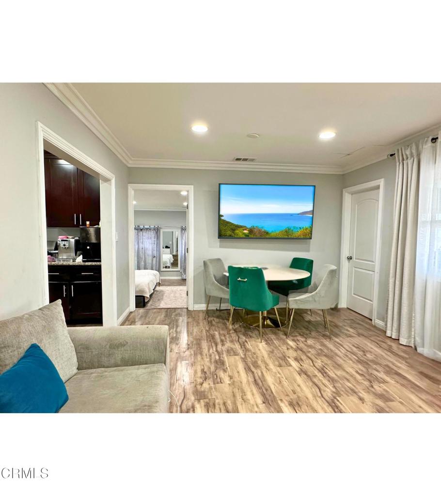 Discover this inviting property located in one of Pacoima's most desirable and family-friendly neighborhoods. Fully gated for added privacy, this residence offers a functional layout, perfect for daily life and special gatherings. The home features 4 bedrooms, including a generously sized primary suite. The converted garage has been transformed into a versatile recreation area, offering the ideal space for a game room, home gym, office, or even a potential for a future ADU.  Step outside into the spacious backyard, beautifully finished with custom granite flooring and lush artificial turf for a clean look and low maintenance.  Whether you are hosting family gatherings or relaxing on the weekend, the outdoor space is designed to impress. This home is ideal for growing families looking for space, convenience and privacy.