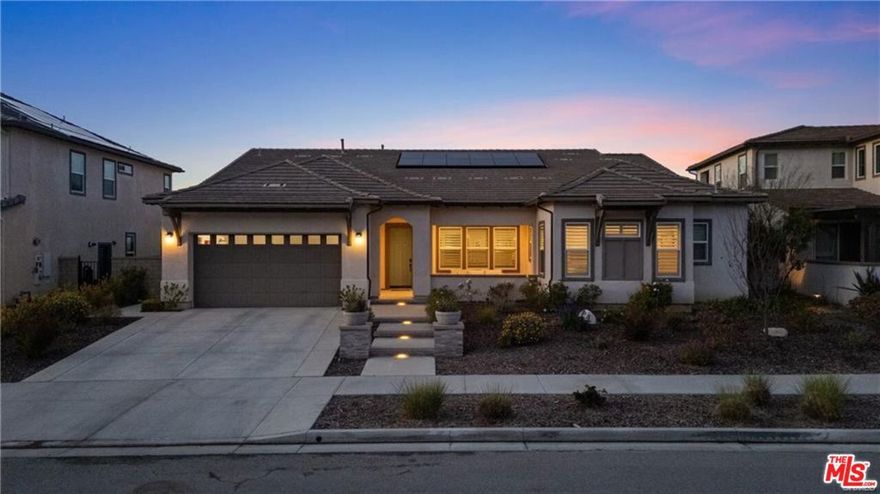Stunning Single-Story View Home in Aliento Gated Community! This light and bright over 3000 SF single story 4-bedroom and 3.5 bathroom home offers breathtaking views, modern upgrades, and a prime location in the highly sought-after Aliento gated community. Step onto the charming covered front patio and take in the beautifully landscaped and hard-scaped front yard before heading inside. Designed for seamless indoor-outdoor living, this home features high ceilings, wood-like tile flooring, abundant windows, and recessed lighting throughout. The stacked sliding glass doors in the great room provide stunning panoramic views and effortless access to the outdoor living space. The chef's kitchen is a true showstopper, featuring ceiling-height upgraded cabinetry with soft close throughout the house, a 6-burner Wolf gas cooktop, double ovens, a 48-inch Sub-Zero fridge, quartz countertops, pendant lighting, custom glass tile backsplash, and a super large island with kitchen sink. Additional cabinetry in the eat-in dining area and a spacious walk-in pantry provide ample storage. A bright dining space with a convenient backyard access door makes it easy to enjoy the incredible views and walk outside. The primary suite is a peaceful retreat, offering high ceilings, large windows, and an en-suite bath with a privacy door entry, dual sinks, a soaking tub, a separate shower, and a massive walk-in closet plus an additional access door to the laundry room. On the opposite side of the home, three secondary bedrooms provide great flexibility one with a private en-suite bath and two sharing a Jack-and-Jill bathroom with dual sinks and a separate shower/toilet area. A stylish powder room for guests complete this perfect entertainer's home. This home is packed with high-end upgrades, including top of the line tile choices, a whole-house fan, tankless water heater, 7.1 surround sound system, Milgard windows, and solar panels for energy efficiency. The backyard is built for both relaxation and entertaining, featuring a covered California room patio with an outdoor TV and fireplace, a grassy area, a built-in BBQ, a tranquil fountain, and a gas firepit all overlooking breathtaking hillside, canyon, and valley views. Beyond your home, enjoy resort-style amenities, including a pool, kids' splash pool, cabanas, hiking trails, clubhouse, fitness center, parks, dog parks, bocce ball courts, BBQ area, and more! This incredible home truly has it all don't miss your chance to make it yours!