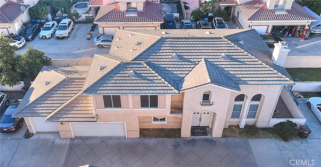 NO HOA. Welcome to this lovely 4-bedroom, 3-bathroom PUD home, offering a perfect blend of comfort and functionality. The guest suite on the main floor provides ideal privacy and convenience, perfect for multigenerational living or visiting guests. Step into a spacious and inviting living room with abundant natural light streaming through large windows, complemented by elegant marble flooring throughout the main level. The formal dining room sits just off the living room, featuring a sliding door that opens to the yard, perfect for indoor and outdoor entertaining. A cozy fireplace offers both gas and wood-burning options for added warmth and charm. The family room flows seamlessly into the gourmet kitchen, where you’ll find expansive quartz countertops, custom cabinetry, and stainless-steel appliances, ideal for both everyday living and hosting. Upstairs, you’ll find three bedrooms and two bathrooms, along with a bright and open loft area that’s perfect for a home office or play space. Retreat to the expansive primary suite, complete with a private balcony where you can enjoy peaceful mornings and tranquil evenings. The updated bathrooms include a newly remodeled 3/4 bath, glass-enclosed showers, and stylish tile flooring. This home also offers two generous backyard spaces with lawns, providing the perfect setting for relaxing, entertaining, or creating your own private oasis. Conveniently located near markets, restaurants, parks, schools, and more, this property is the perfect combination of comfort, style, and convenience. Don’t miss the opportunity to make this beautiful home yours.