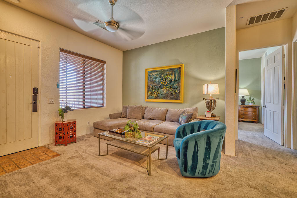 Welcome to your desert escape in the heart of charming Old Town La Quinta. This beautifully maintained upper-level condo offers the perfect blend of comfort, convenience, and income potential. Nestled in the desirable Casitas Las Rosas community, this 1-bedroom, 1-bathroom retreat is ideal for personal enjoyment, a weekend getaway, or a lucrative short-term rental investment.Step inside to discover a warm and inviting living space featuring plush furnishings and a cozy gas fireplace--perfect for relaxing after a day of exploring the Coachella Valley. The open-concept layout flows seamlessly into a fully equipped kitchen with all major appliances, generous countertop space, and a convenient breakfast bar for casual in-unit dining.Just off the kitchen, a stacked washer/dryer is discreetly tucked away for added functionality. The full bathroom includes a shower/tub combination, single vanity, and storage cabinet space. The spacious bedroom features a king-sized bed, nightstands, wall-mounted TV, and an expansive walk-in closet--providing comfort and storage for extended stays.Outside, enjoy your morning coffee or sunset views from the balcony entrance, with tranquil mountain vistas and a peaceful atmosphere. Located directly above a serene community pool and hot tub, this condo is the ultimate spot to soak in the desert lifestyle.Whether you're strolling to nearby restaurants, shops, and events in Old Town La Quinta or taking a short drive to golf courses, hiking trails, and festival grounds, this location puts you in the center of it all. Casitas Las Rosas is one of the few communities in the area that allows for short-term rentals, making this property a standout choice for investors.With flexible use options and professional management in place--the listing broker also serves as the property manager and can provide rental income history upon request--this condo is ready to serve as your next successful vacation rental or personal hideaway. Don't miss your chance to own a slice of paradise in one of the Coachella Valley's most beloved communities!