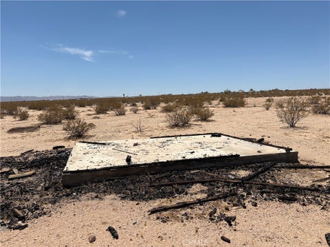 Photo of 101 Bluegrass Avenue, 29 Palms, CA 92277 (MLS # JT26172315)