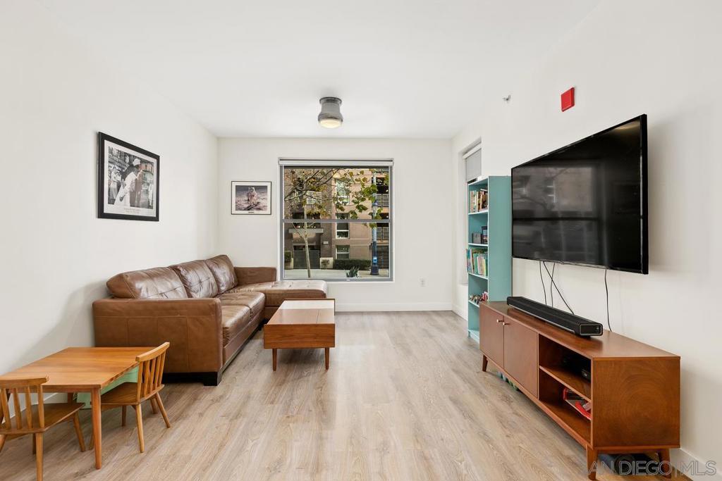 Beautiful 1 bedroom + Den/Office in Metrome. This exterior facing unit provides wonderful natural light from large windows and highly sought after Den space that can easily be used as a second bedroom. Imagine having a proper 1 bedroom with dedicated work space... or a guest bedroom? This is it! Unit features upgraded laminate flooring and premium carpet throughout. The bathroom flooring has been upgraded with sleek azure chevron tile. New Custom A/C unit installed. 1 parking and 1 storage unit included. Metrome provides an array of amenities including lounge room, fitness center & coded bike storage. Located in the heart of East Village close to petco park, library, and more! Beautiful 1 bedroom + Den/Office in Metrome. This exterior facing unit provides wonderful natural light from large windows and highly sought after Den space that can easily be used as a second bedroom. Imagine having a proper 1 bedroom with dedicated work space... or a guest bedroom? This is it! Unit features upgraded laminate flooring and premium carpet throughout. The bathroom flooring has been upgraded with sleek azure chevron tile. New Custom A/C unit installed. 1 parking and 1 storage unit included. Metrome provides an array of amenities including lounge room, fitness center & coded bike storage. Located in the heart of East Village close to petco park, library, and more!