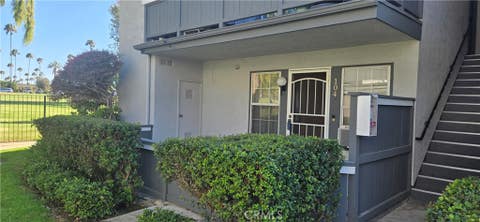 Photo of 18292 Parkview Lane #104, Huntington Beach, CA 92648 (MLS # PW26158662)