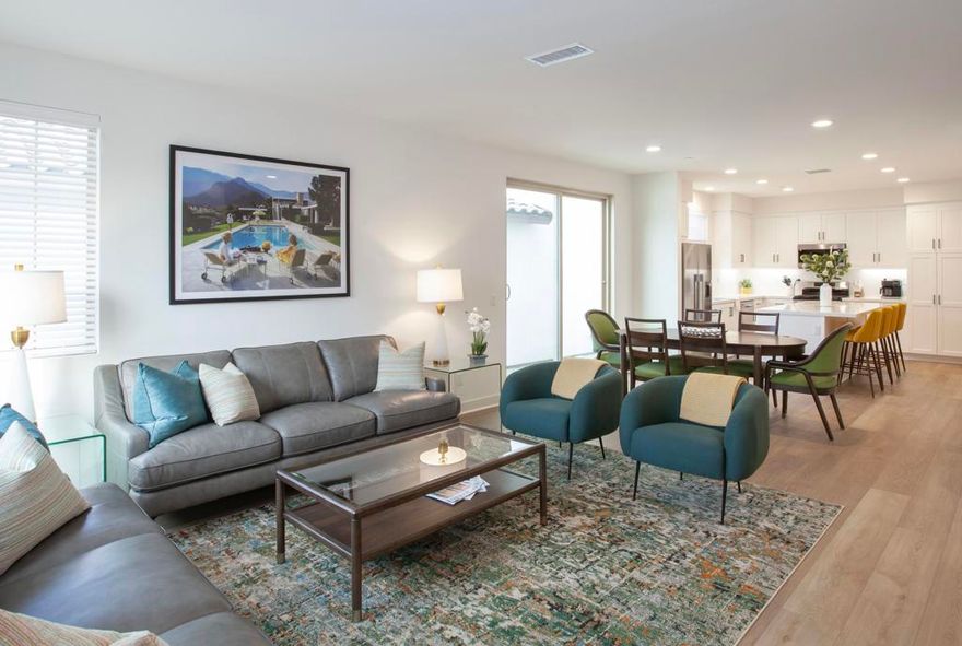 Turnkey furnished home in the recently built, short term rental approved, community of PGA West Signature.  Professionally curated by award winning interior designer, Patricia Lockwood, of Design Vision Studio, this 1960 square foot home is not to be missed.  Situated on a south facing lot with Santa Rosa mountain views and just a few steps to the Signature Clubhouse, resort style pool, and fitness center.  This open concept floor plan features a chef's kitchen with stainless steel appliances, quartz countertops and white shaker cabinetry.  The primary bedroom is located downstairs with a large ensuite bath with double vanity and quartz countertops.  Two separate living/entertaining areas highlight the home; one on the main floor, and upstairs you will find the Frank Sinatra inspired bonus room, with wet bar.  Two additional guest rooms and a full bath round out the upper level.  Relax and entertain in the secluded front yard patio for al fresco dining and evenings spent in front of your private firpit overlooking Coral Mountain.  PGA West boasts 6 golf courses (3 public, 3 private) as well as a state of the art Fitness and Sports Club (separate membership).  This meticulous home is currently being used as a short term rental and is being sold turnkey furnished.  HOA fees include 24 hour guard gated security, internet, cable and front yard maintenance.  Leased solar is $39/month and must be assumed by new buyer.  Buyer to pay City transfer fee.