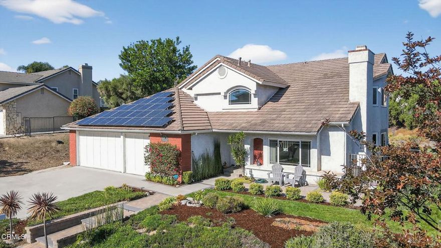Set on a peaceful half-acre, with incredible views, in one of Camarillo's most inviting neighborhoods, this 2,574 sq. ft. home offers a wonderful place to settle down.  You'll love the sense of openness, natural light, and privacy that make this home feel like a private retreat.  The custom front walk-way and patio welcome you into the home.  Inside, the open layout filled with natural light and high ceilings create a sense of airiness throughout while the floor plan flows effortlessly.  A formal living room invites you to settle in by the fireplace while the dining room leads to a side patio for outside dining. The wet bar with custom wood countertop is adjacent to the family room which is highlighted by a fireplace and slider to the backyard making entertaining easy.  The kitchen's boasts a walk-in pantry and garden window that perfectly frames the mountains adding enjoyment while cooking.  The downstairs features a spacious bedroom with vaulted ceiling, and slider to the backyard -- perfect for guests or a home office with its own outdoor access.  Upstairs, the primary suite features vaulted ceilings, dual sinks, a walk-in closet, and a private balcony to take in the panoramic views. Two additional bedrooms share a convenient full bath.  Retreat to the backyard for relaxing and entertaining -- with multiple patios, raised garden beds, and 'infinity' grass that seamlessly stretches toward the breathtaking views. Fruit trees (avocado, orange, guava, lemon, grapefruit, and fig) adorn the property, offering both beauty and bounty  -- perfect for pets, play, and views. The oversized 3-car garage offers room for vehicles, storage with space for hanging out or working on projects.  With an owned 4.25 kW solar system and smart home features including connected thermostat, irrigation, and security systems, this home blends modern comfort with peaceful, view-filled living. It's the perfect mix of beauty, function, and serenity -- a home you'll never want to leave.