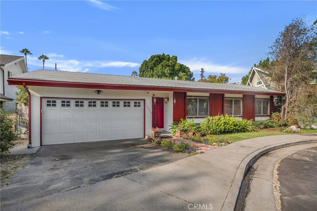 Tucked away at the end of a peaceful cul-de-sac in the heart of Valley Glen, this 3-bedroom, 2-bathroom home offers just under 2,000 sq ft of living space on a generously sized lot. With a thoughtfully designed single-level layout, this home offers ease and comfort for all stages of life. Bonuses include brand new HVAC, roof installed in 2020, and endless potential, the home is move-in-ready while also presenting an exciting canvas for reimagining the layout with a design to suit your style. The inviting living room features a striking floor-to-ceiling stone fireplace and sliding glass doors that open to a large, covered patio—creating seamless indoor-outdoor flow perfect for entertaining. The spacious kitchen and breakfast nook are filled with natural light and offer direct access to both the garage and side yard, while easily lending themselves to an open-concept layout with the adjacent living area. A versatile bonus room just off the living room presents endless possibilities: fourth bedroom, home office, media room, or guest suite. Two secondary bedrooms share a full hall bathroom with dual sinks, and the private primary suite features a ¾ en-suite bath and its own access to the patio through a third set of sliding doors. The backyard, though irregular in shape, is rich with mature trees, green lawn, and multiple access points from inside. The 2-car attached garage includes generous space for storage, plus a dedicated laundry area for added convenience. Located minutes from the Sherman Oaks Galleria, NoHo Arts District, and Westfield Fashion Square, this home also offers quick access to the 101, 170, and 405 freeways—making it a prime location with easy reach to shopping, dining, entertainment, and more. A wonderful blend of comfort, character, and potential in a highly desirable neighborhood — this home is ideal for today’s lifestyle with potential to make it truly your own.