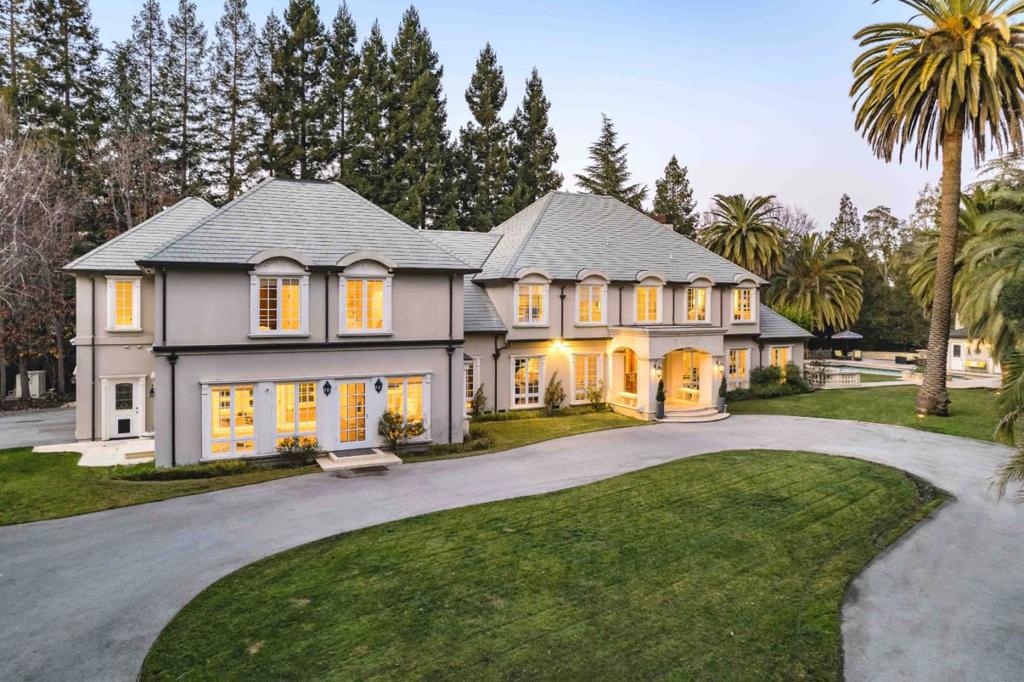 Privacy and luxury converge in this Atherton estate set on pristine grounds of over an acre. Emanating style and elegance from the moment you step inside, this home enjoys numerous custom details throughout over 6,800 sf of living space. Highlights include finishes of stone, marble, and mahogany, as well as expansive formal rooms, ample office and storage space, multiple fireplaces, and a gourmet kitchen anchored by a La Cornue range. Many of the homes 5 bedrooms are en suite, including the primary suite with a spa-like bathroom as well as a fireplace and sitting room. The grounds invite entertaining on a grand scale with a pool, outdoor kitchen, fireplace, and sprawling patio. And this outstanding location puts you within easy reach of everything the Bay Area has to offer including downtown Menlo Park and Palo Alto, Stanford University, Sand Hill Road, international airports, and many of the areas finest public and private schools (buyer to verify eligibility).