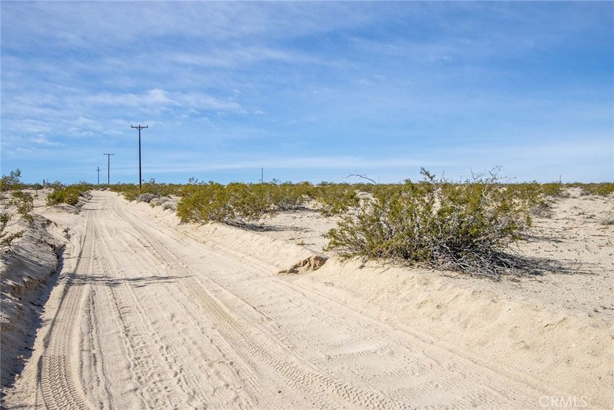 Great opportunity to acquire this 5.00-acre lot in the Desert Heights area, with development or investment potential. Zoning RL-5 for the perfect rural, tranquil environment. The lot size offers 217,800 sq ft of flat land with panoramic views of the mountains. A few miles from the famous Joshua Tree National Park and the City of 29 Palms shopping and dining area. The address is not official; it is only given for location orientation.
