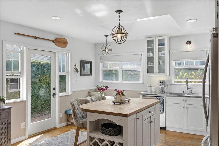 Welcome to 903 Moana Drive, where coastal charm meets laid-back luxury in one of Point Loma’s most coveted pockets, near Sunset Cliffs and the Wooded Area. This single-story home sits on a quiet corner lot and offers 3 bedrooms, 2.5 baths, and 1,682 square feet of thoughtfully designed space. The inviting layout flows seamlessly from the bright living areas to a spacious backyard that’s perfect for relaxing or entertaining. The finished garage adds flexibility for a home gym, office, or bonus hangout. The standout feature is the incredible primary suite, complete with a private door leading directly to the backyard, creating an easy, indoor-outdoor connection. A rare find in a peaceful neighborhood just minutes from the beach, schools, and all that Point Loma has to offer.