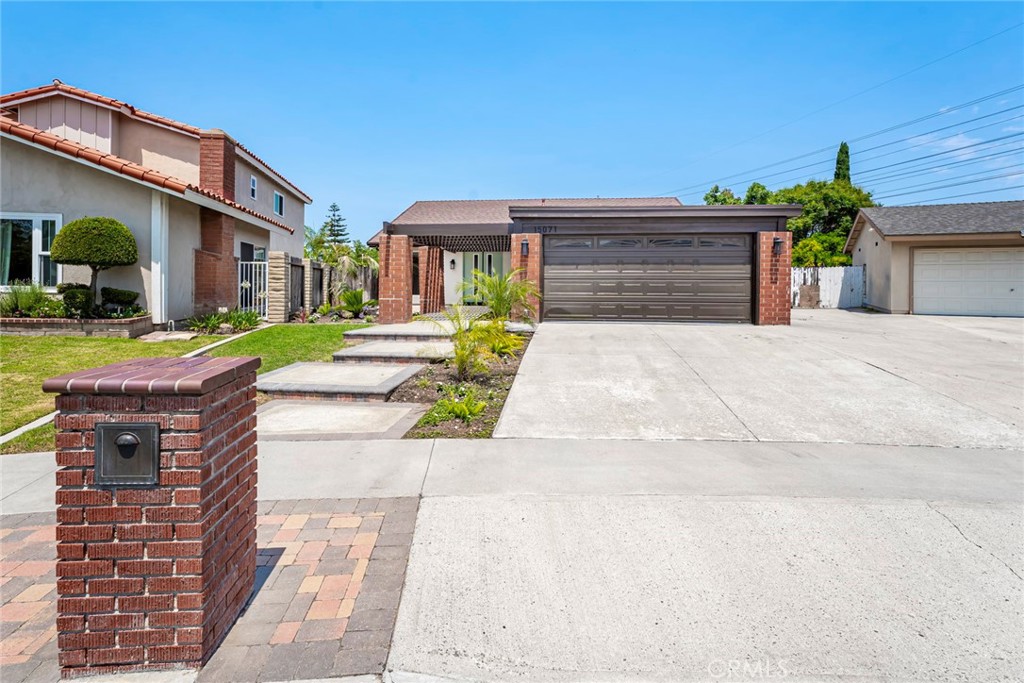 Welcome Home! This spectacular single level home located in the heart of irvine has been meticulously upgraded throughout. Featuring New Flooring, New Lighting, New Windows and much more. At a street level glance, you will first notice the extra large driveway with room for a boat or possibly a recreational vehicle. At the entry is an elegant double door entry to a light and bright setting. The Living Room features vaulted ceilings and New Pendant and Recessed lights. In the kitchen/family room area, a brand new gourmet kitchen with New Cabinets, Farm Sink, Stainless Steel Double Oven, Microwave and Dishwasher were just installed. The New countertops and full backsplash are made of tasteful quartz with a conveniently easy to clean Island 'waterfall' feature. An inviting fireplace in the Family Room/Dining Area is there to welcome you and your guests. Each bedroom has a New Lit Ceiling Fan and New recessed lighting. the bathrooms have been remodeled from top to bottom with New shower & Tub, New shower enclosure in the Primary bedroom en suite, New Bluetooth Vanity Mirrors, Lighting and flooring. Stay cool and save on your energy bill this Summer with a Whole House Fan in addition to a fully ducted HVAC system too. The Backyard is perfect for weekend BBQ's with a large covered patio, expansive lawn and open space. Even the garage got a new look with brand new epoxy floor and fresh paint throughout. Located near award winning schools, UCI, Local Beaches, Shopping, Parks, Public Golf Course, Hiking/Biking (Walnut Trail), Major Freeways and Toll Roads. Don't Miss Out!!!