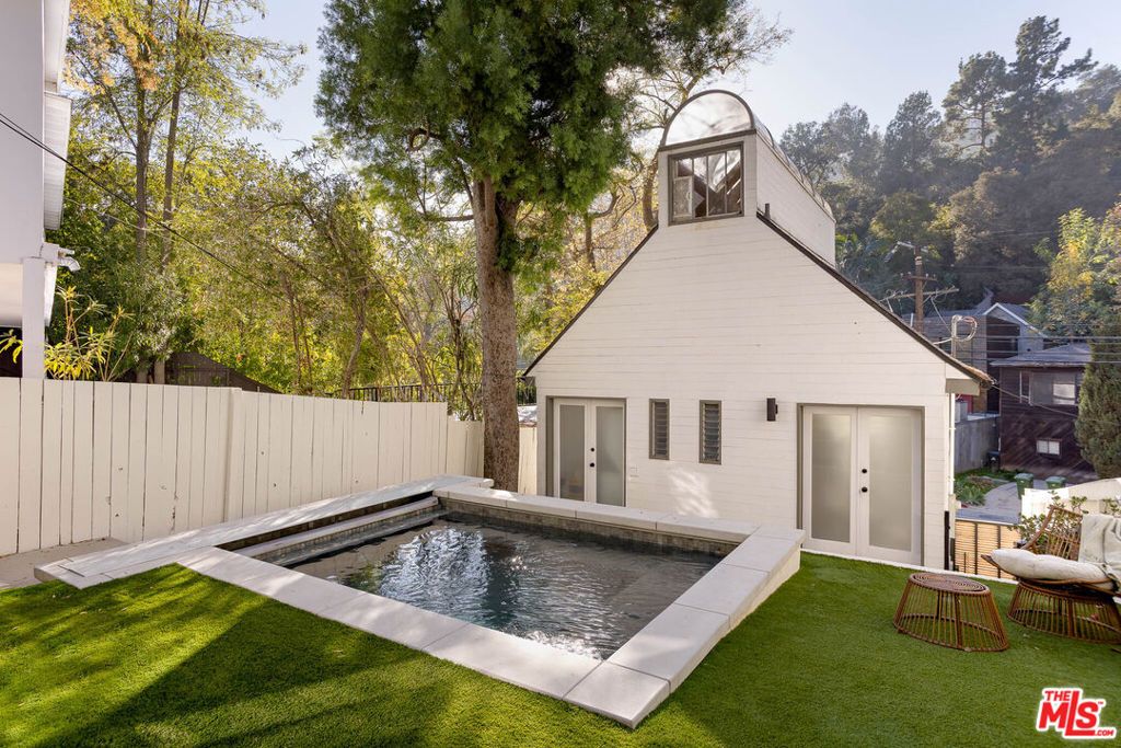 Photo of 1906 N Beverly Glen Boulevard, Los Angeles, CA 90077 (MLS # 26634665)