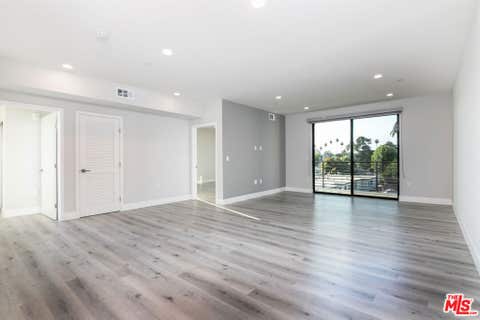 Photo of 14612 Calvert Street #301, Van Nuys, CA 91411 (MLS # 26890635)
