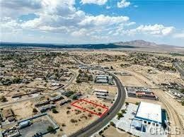 COMMERICAL LOT IN EXCELLENT LOCATION! High Visibility for your business. Many homes, apartments, and businesses in the area. Vacant lot. Great for your small business. Drive by to envision your business potential today! Water and Electricity at street. Buyer to verify with County and city regarding utilities, permits and business use. Located right next door to Picture Purr-fect Dog grooming. Located one mile from Hwy 15 exit.