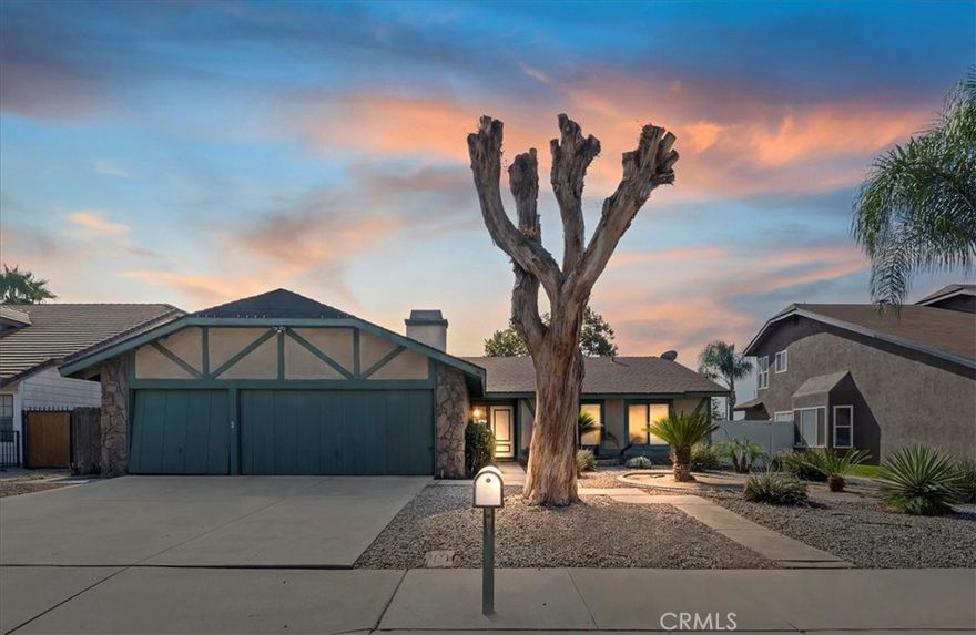 Bring your imagination and modern vision to this 1980s home located in the desirable Indian Hills community of Jurupa Valley. With great bones and endless potential, this property offers the perfect opportunity to live in the home while upgrading it to match your style. Whether you're a first-time buyer or an investor, this is your chance to walk in with built-in equity. The front yard is designed for low maintenance and features drought-resistant landscaping, ideal for easy upkeep and water conservation. This single-story, no-interior-steps home boasts 4 bedrooms, 2 bathrooms, and approximately 1,769 square feet of living space. Inside, the living room with a fireplace flows seamlessly into the kitchen, formal dining area, and family room—perfect for everyday living. The spacious primary bedroom includes a generous walk-in closet that easily accommodates a larger wardrobe. The en-suite bathroom is thoughtfully designed, featuring dual raised sinks with a granite countertop, a separate oval soaking tub, and a walk-in tile shower. The home also includes a 3-car attached garage, and the backyard is landscaped with a well-maintained grassy area—ideal for outdoor enjoyment. Enjoy the benefits of NO monthly HOA fees, affordable homeowners insurance, and low property taxes. Conveniently located near golf courses, shopping, dining, and the Jurupa Valley/Pedley Metrolink Station, this home offers easy access to everything you need. Don’t miss out on this incredible opportunity!