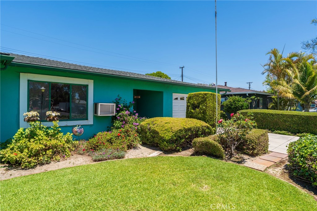 Charming 1960s home in the heart of Santa Ana’s desirable New Horizons neighborhood! This lovingly maintained 3-bedroom, 1.75-bathroom home sits on a spacious 6,300+ sq ft lot with lush front and backyards full of mature plants and shrubs. Owned for over 50 years by the original family, the property offers a great opportunity to update and make it your own. Ideal as a starter home or for investors looking to add an ADU. Conveniently located near major freeways with easy access to LA and South Orange County. Enjoy premier shopping at South Coast Plaza, South Coast Marketplace, and Metro Pointe, plus explore nearby cultural gems like the Heritage Museum, Marconi Automotive Museum, Bowers Museum, Discovery Cube, and the OC Museum of Art—all just minutes away.