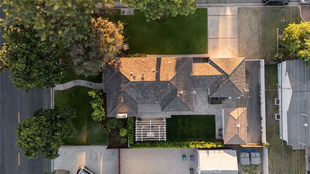 Welcome to this beautifully reimagined 3-bedroom, 2-bath home in the highly desirable Lakewood Village neighborhood of Long Beach. Perfectly situated on a generous 8,044 sq. ft. corner lot, this property offers not only a stunning residence but also incredible potential to expand and customize to your lifestyle.
Step inside to find an open-concept floor plan where the living room, dining room, and kitchen flow seamlessly together—ideal for both everyday living and entertaining. The gourmet, custom-designed kitchen is brand new and thoughtfully appointed with sleek porcelain countertops, all-new cabinetry, top-of-the-line appliances, upgraded plumbing, and clever storage solutions. A custom, hidden laundry area is tucked conveniently off the kitchen, while the third bedroom—currently staged as an office—offers flexible space to suit your needs.
Timeless character meets modern convenience with original oak wood floors that have been beautifully refinished and sealed, complemented by upgraded electrical, USB outlets throughout, and enhanced internet connectivity.
Just beyond the main living area, dual French doors open to a private backyard retreat. A new pergola creates a shaded, inviting outdoor living and dining space, blending indoors and outdoors effortlessly. The expansive yard—both front and side—offers endless opportunities, from lush landscaping to play areas, gardens, or even future expansion.
Additional highlights include a detached two-car garage, a large breezeway that could be incorporated into the home’s footprint, and a versatile flex structure that presents an exciting opportunity for conversion into an ADU—perfect for generating rental income or hosting extended family.
Located across from Lakewood Country Club, this home places you near parks, shopping, dining, and major freeways, offering both convenience and community in one of Long Beach’s most sought-after neighborhoods.
Don’t miss your chance to own this one-of-a-kind property where thoughtful upgrades, timeless charm, and future possibilities all come together.