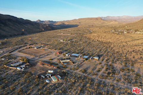 Photo of 55626 Pipes Canyon Road, Yucca Valley, CA 92284 (MLS # 26656613)
