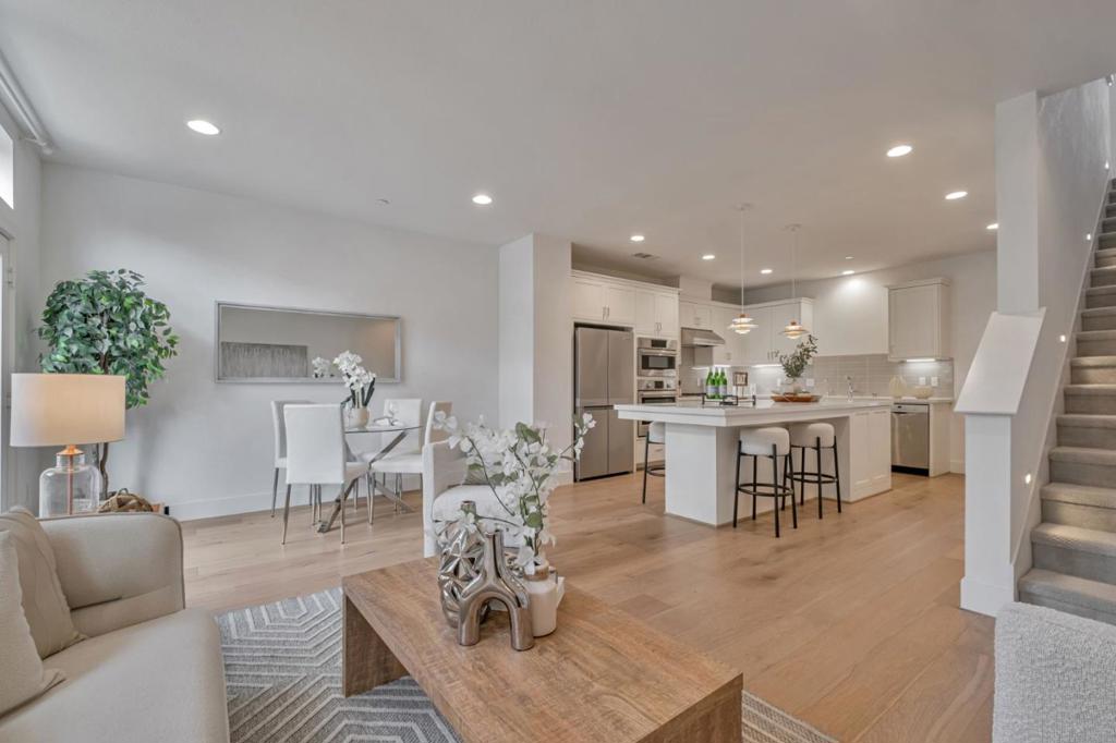 Gorgeous 4-bedroom, 4-bath townhouse in highly sought-after downtown Fremont, featuring 3 ensuite bedrooms, a modern kitchen with top-of-the-line appliances, and upgraded bathrooms including a primary suite with double sinks. Conveniently located near I-880/680, Dumbarton Bridge, and within walking distance to BART and walking distance to major company shuttle stops (Meta, Google, Apple, etc.). Close to restaurants, banks, Whole Foods, Trader Joes, Safeway, Target, hospitals, parks, and vibrant neighborhood amenities. Move-in ready and a must-see!