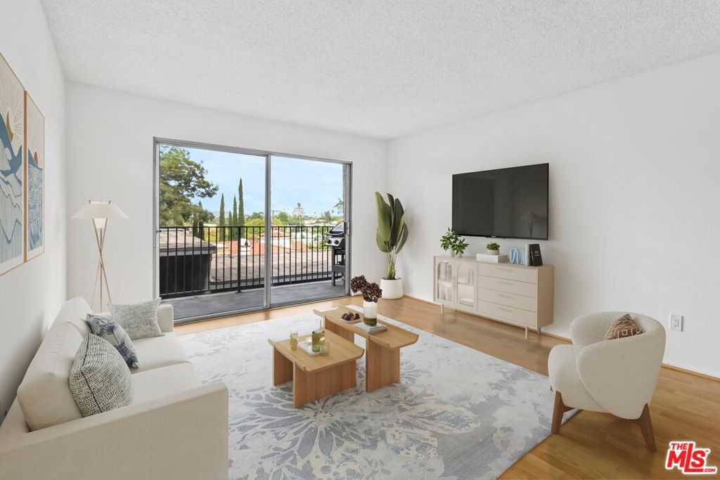 Enjoy resort style living in this lovely 1bd, 1ba condominium in Glendale! Located atop a treelined strret at the end of a peaceful culdesac, this turnkey home features pergo flooring, pocket doors, abundant storage, and a balcony with sweeping mountain and city views. The gated complex features a large pool and spa, and carport parking. A few short minutes from the Americana and Galleria, and centrally located near NELA, Silverlake, Atwater Village, and the 2 and 134 fwy- this unit presents a wonderful opportunity for a first time homeowner or as an investment property