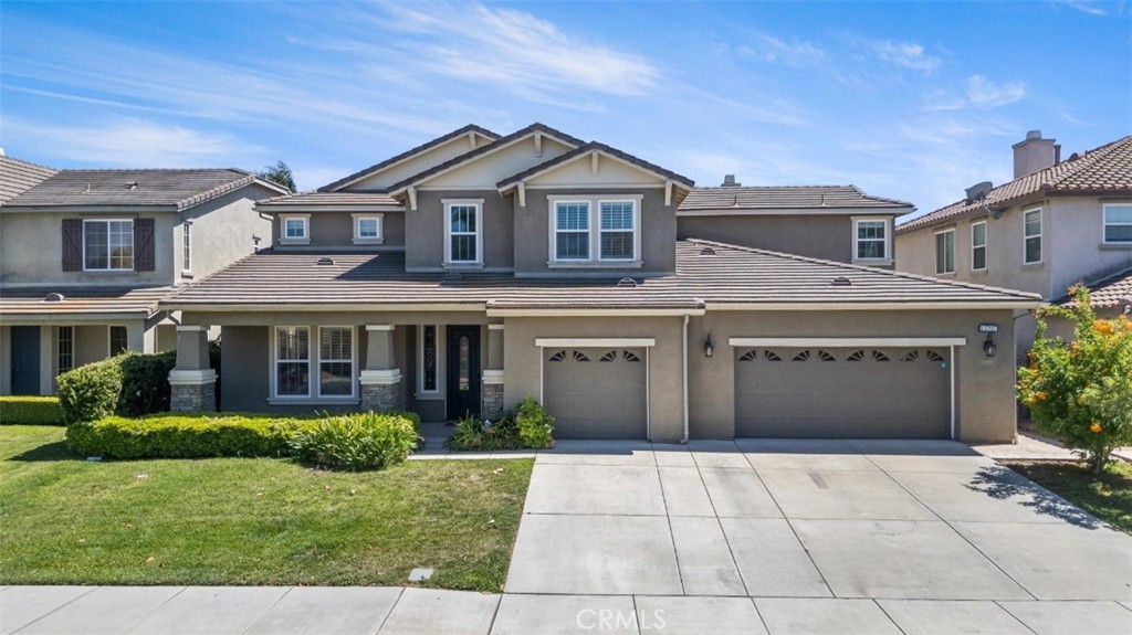 Welcome to this stunning 5-bedroom, 3.5-bathroom home located in the desirable Parkside community of Eastvale. Built in 2008, this spacious 4,141 sq ft residence sits on a 10,018 sq ft lot and features a bright, open floor plan perfect for entertaining. The gourmet kitchen boasts Wolf stainless steel appliances, granite countertops, tile backsplash, a center island, and abundant cabinetry. Downstairs offers a guest suite with full bath, formal living and dining rooms, and a large family room with fireplace. Upstairs includes a generous loft/bonus room, laundry room with storage, and spacious secondary bedrooms. The luxurious primary suite offers a walk-in closet, soaking tub, dual vanities, and separate shower. The private backyard includes a covered patio and fire pit—ready for outdoor enjoyment. Conveniently located near award-winning schools, shopping, parks, and freeways. Don’t miss the opportunity to own this move-in ready home!