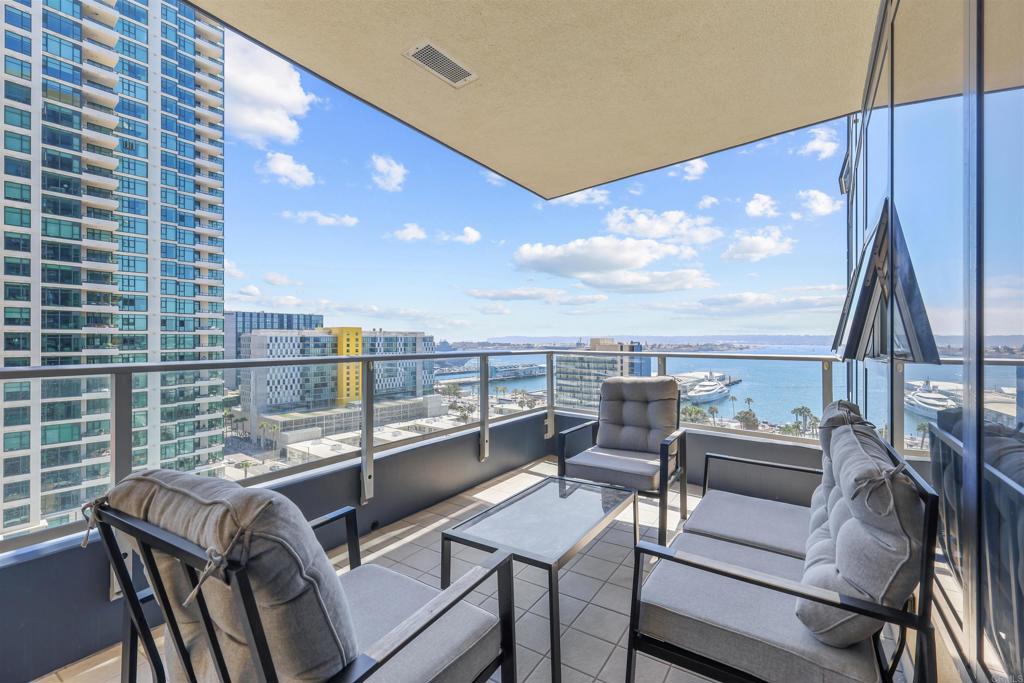 An elegant destination in Downtown San Diego well appointed with high end Viking appliances. Facing the southwest, wake up to ocean, bay, mountain and city views . Plenty of space to entertain with 2 bed + den 2 bathrooms. Amenities include a movie theater, wine tasting room/ cellar, reading library, conference center, sauna, steam room, swimming pool, hot tub and gym. A 24 hour security and concierge team welcome you and your guests upon every entry to the building and you pay no guest fees!