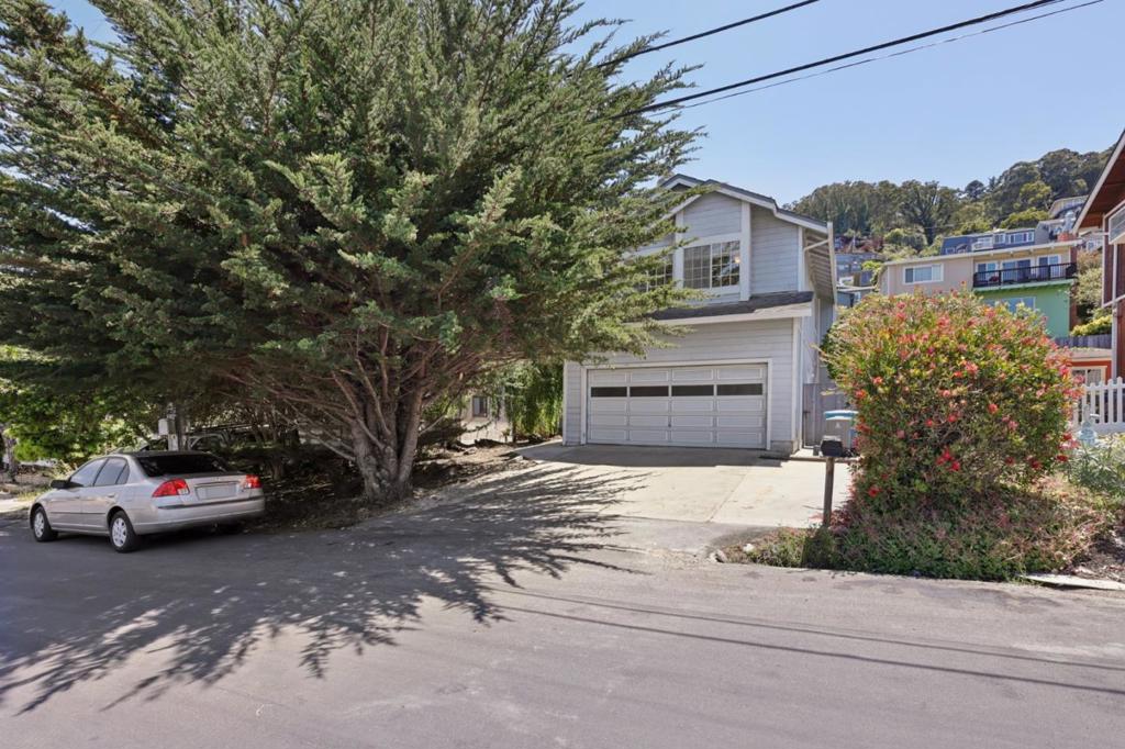 PRICE IMPROVEMENT! Welcome home! Charming Pedro Point home located in one of the most desirable neighborhoods in beautiful Pacifica awaits. The home offers a comfortable airy abode. The high vaulted ceiling invite you into a large living room, currently setup for home theater. The kitchen is well-equipped with gas range, dishwasher, tile counters making meal preparation a breeze. Custom hardwood floors provide a cozy warmth and elegance to the family room, dining area and kitchen. For cozy evenings, enjoy the fireplace in the family room. Central forced air heating ensures your comfort during cooler months, with a ceiling fan in the dining area for the warm summer days. Additional amenities include an in-home laundry area with a washer and dryer, a convenient half bath on the ground floor, The second story has three good sized bedrooms, with ample closet space. The primary bedroom provides 2 large closets and vaulted ceiling. A skylight in the primary bathroom brings in natural light to the spacious bath. The property also boasts a 2-car garage and 3-car parking on the driveway. The backyard has a level patio for outdoor enjoyment and storage shed This home is located in the Pacifica Elementary School District. Don't miss the opportunity to make this lovely home your own!