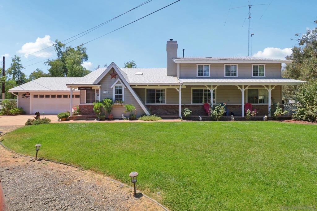 First time on the market in over 20 years! Quintessential two-story, ranch style home on a HUGE (just under an acre) lot. This house simply "feels like home." As you pull onto the lot, you're greeted by a large round about and ample parking. Inside, you walk right into the family room and see through the open concept into the modern kitchen. The living area includes exposed beams, hardwood flooring, and a wood burning fireplace. Three of the bedrooms, including the primary, are downstairs. Upstairs, you'll find a second living area, an office/optional 4th bedroom, and another large bonus area/playroom. Back outside is a spacious lot, with a koi pond, green grass & beautiful trees, play space, and additional sheds/structures. 2 car garage with side by side washer & dryer.