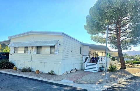 Photo of 54999 Martinez Trail #45, Yucca Valley, CA 92284 (MLS # JT26172274)