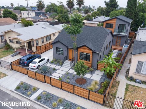 Photo of 1428 W 54th Street, Los Angeles, CA 90062 (MLS # 26834863)