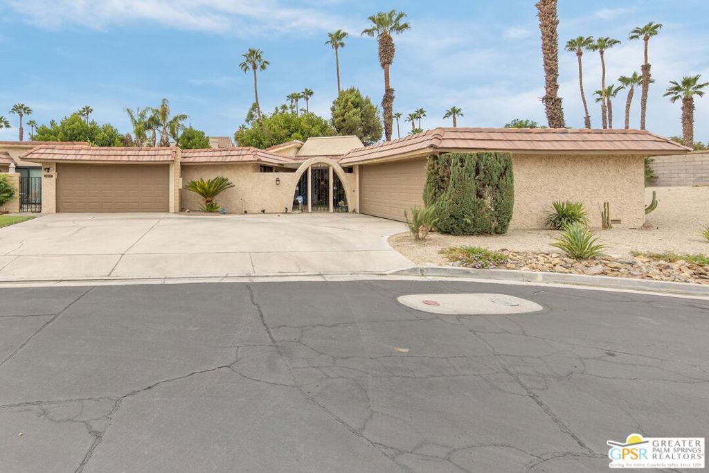 Situated at the end of a peaceful cul-de-sac, this beautifully updated 2-bedroom, 2-bathroom home in Cathedral Canyon Country Club blends modern elegance with desert serenity. This home features a chef-inspired kitchen equipped with high-end appliances and sleek flooring throughout. The garage includes storage cabinets for added convenience. The home's private setting provides peace and quiet while still offering easy access to community amenities, including refreshing pools for those warm desert days. The semi-private backyard is a peaceful oasis, complete with a charming patio perfect for relaxing or entertaining. This home presents an incredible opportunity to embrace the desert lifestyle. Don't miss out on owning a piece of paradise in this sought-after community.