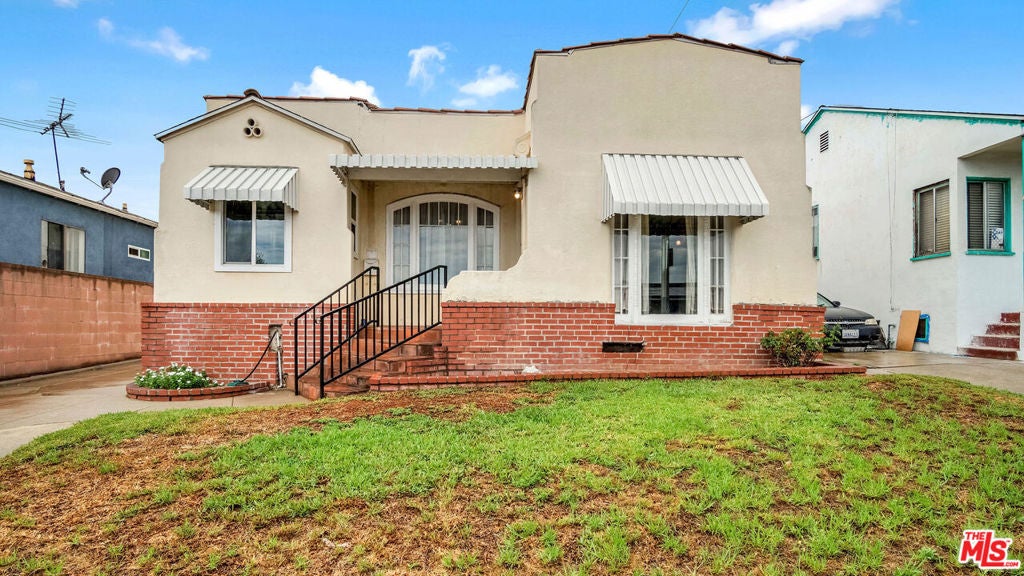 Photo of 377 Clela Avenue, Los Angeles, CA 90022 (MLS # 26984883)