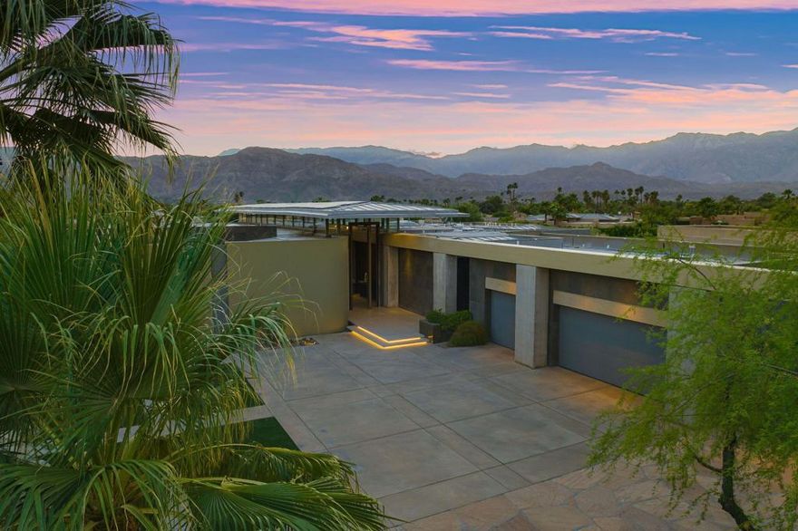 Located behind the gates of Cypress Pointe, this modern masterpiece was designed by the world-renowned architectural firm of Olson-Kundig. Built by Stoker Construction, the timeless property consists of over 8590 sqft of luxurious and resort-like amenities.From the custom 16-foot art glass entry door, one enters the dramatic foyer/gallery with 17-foot ceilings and is led to the expansive dining room, step-down living room, and media room with wet bar. A loggia and an extensive terrace offer panoramic south and west views. The gourmet kitchen features a breakfast room with views, additional counter seating, a large pantry, and access to a large patio staging area for caterers.The luxurious primary suite features dual dressing rooms and closets, patio access to a private spa, dual offices, an exercise room, and a sauna. Additionally, in the main house, there are two large ensuite guest rooms with private patios.The poolside guest house features two ensuite bedrooms with a large living/media area. The expansive terrace and gardens feature a negative edge pool with a waterfall, an additional spa, an outdoor kitchen, and are all surrounded by privacy and dramatic views. A three-car garage and multiple storage areas complete the property. Adjacent and set below the western boundary of this estate property are two additional lots inside the gates of Artisan. They can be sold separately if the Buyer of 10 Canyon Creek does not wish to purchase them. They are listed on MLS.