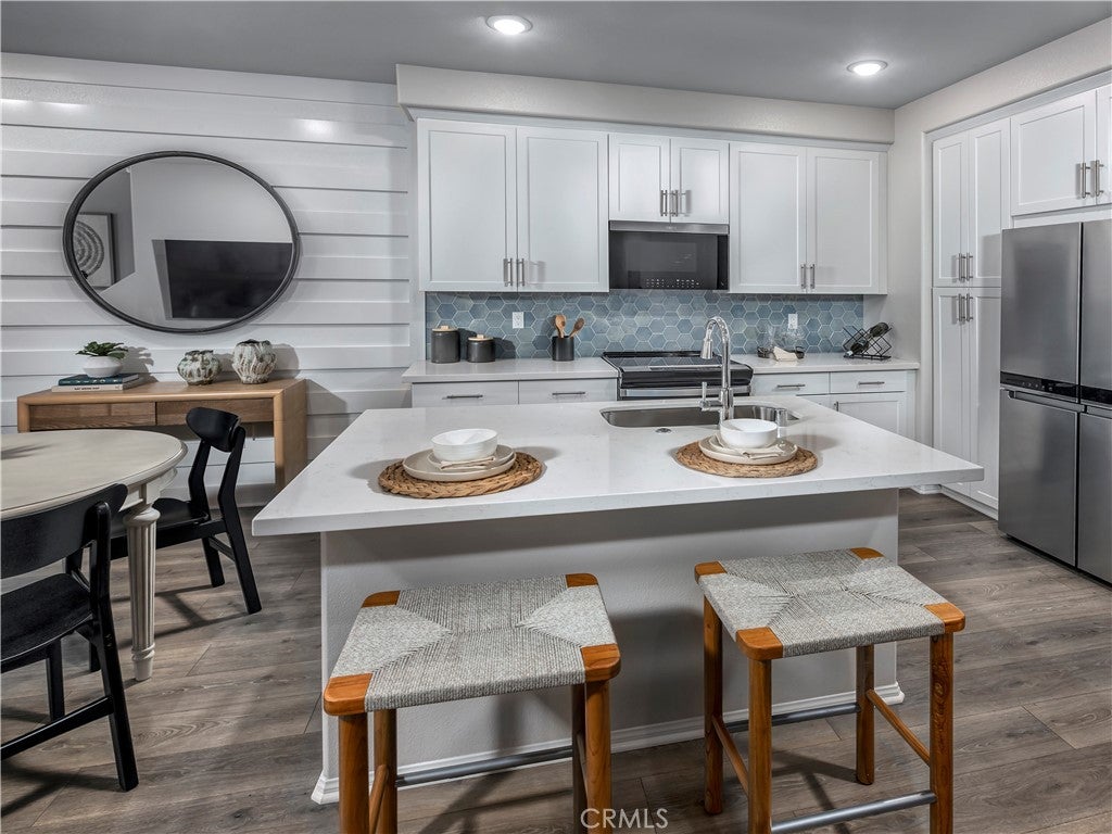 Photo of 603 Lotus Drive, San Marcos, CA 92069 (MLS # OC26197166)