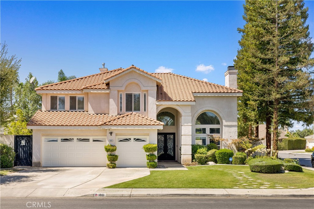 Discover refined living at 1001 Sungro Way, located in the prestigious and serene Seven Oaks Estates community. This quiet, high-end neighborhood is one of Bakersfield’s most desirable areas, offering both exclusivity and convenience. Families will appreciate being within walking distance of top-rated schools including Ronald Reagan Elementary, Earl Warren Junior High, and Stockdale High.
This beautifully renovated home showcases 4 spacious bedrooms, 3 full bathrooms, and approximately 3,466 sq. ft. of elegant living space on a 10,018 sq. ft. lot. Every detail has been thoughtfully updated — from fresh finishes and designer lighting, including a statement chandelier, to the seamless blend of modern upgrades and timeless style.
The chef’s kitchen shines with granite counters, a large island, and new cabinetry, opening to the family room with soaring ceilings and a cozy fireplace. The formal dining room and living room create the perfect flow for entertaining, and the impressive entryway features a 22-foot-high ceiling, adding a dramatic sense of openness and luxury.
Retreat to the luxurious primary suite, complete with fireplace, sitting area, and a spa-inspired bathroom featuring a soaking tub, steam shower, and custom upgrades. Secondary bedrooms are generously sized, with one currently configured as a media/game room. The expansive upstairs bedroom can be easily converted into two separate rooms, providing the flexibility for a fifth bedroom if desired.
Step outside to your private backyard oasis — a newly remodeled pool and spa with waterfall feature, putting green, and expansive patio space designed for relaxation and entertaining.
With its quiet, upscale location, top-notch schools, and a fully renovated interior, this property is move-in ready and truly one of Seven Oaks’ finest offerings.