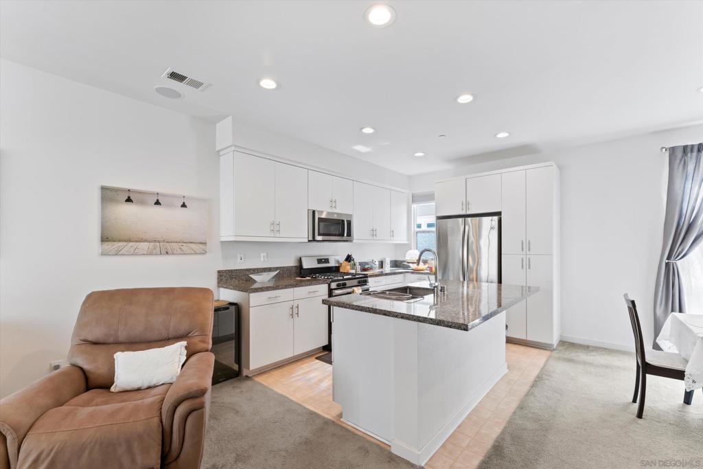 Motivated and Priced to sell, The price includes 10-panel solar system, and an installed Car Charger Station a $25,000 value. This is a stunning tri-level condo located in the highly desirable, newer development of Millenia in East Chula Vista. Freshly painted and move in ready, this contemporary 3-bedroom, 3-bathroom home basis a spacious and versatile floor plan, perfect for modern living. The open-concept main level is filled with natural light and offers seamless indoor-outdoor flow to a private balcony, where you can take in breathtaking views of the surrounding area. The gourmet kitchen is equipped with sleek stainless steel appliances, quartz countertops, and ample cabinet space, making it a chefs dream. Each bedroom is generously sized, with the primary suite offering a serene retreat complete with a walk-in closet and spa-like en-suite bathroom. The Millenia community is rich with amenities, including parks, trails, and convenient access to shopping, dining, and top rated schools. With its prime location, stylish design, and panoramic views, this trip-level condo is the perfect blend of luxury and convenience in the heart of East Chula Vista. Don't miss the opportunity to call this exceptional property home!