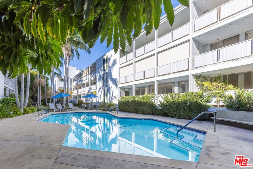 Discover an incredible opportunity to create your dream home on one of the most sought-after streets in the heart of West Hollywood. Bring your contractor and explore this true value-add offering ideal for both owner-users seeking a customizable sanctuary and investors looking for a high-potential project. Located in the exclusive Mid-Century Modern Kings Plaza building, this spacious 2 bed + 2 bath condo features an expansive layout with floor-to-ceiling glass windows and an exceptionally large full-length balcony spanning over 200 square feet, as units in this gated development are well known for their generous outdoor spaces.  Inside, the unit is in need of a full remodel, making it a rare chance to reimagine an extraordinary space and capitalize at an incredible price point in a premier West Hollywood location; an unbeatable combination for those seeking creativity, upside, and long-term value. Additional highlights include in-unit laundry, two side-by-side parking spaces, an elevator-served building, lushly landscaped common areas, and resort-style amenities including a sparkling heated pool and spa. HOA dues cover water, cable, HBO and internet. Perfectly situated on a beautiful tree-lined street near Melrose Place, boutiques, top-rated restaurants, cafe's, farmers markets, shops, and public transportation, this condo offers the ideal blend of tranquility and vibrant West Hollywood living and captures the ideal balance of privacy and dynamic city living. An exceptional opportunity to transform a spacious residence in an iconic building and make it your own in one of the city's most desirable neighborhoods.
