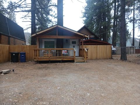 Photo of 1129 Robinhood Blvd, Big Bear City, CA 92314 (MLS # CV26035302)