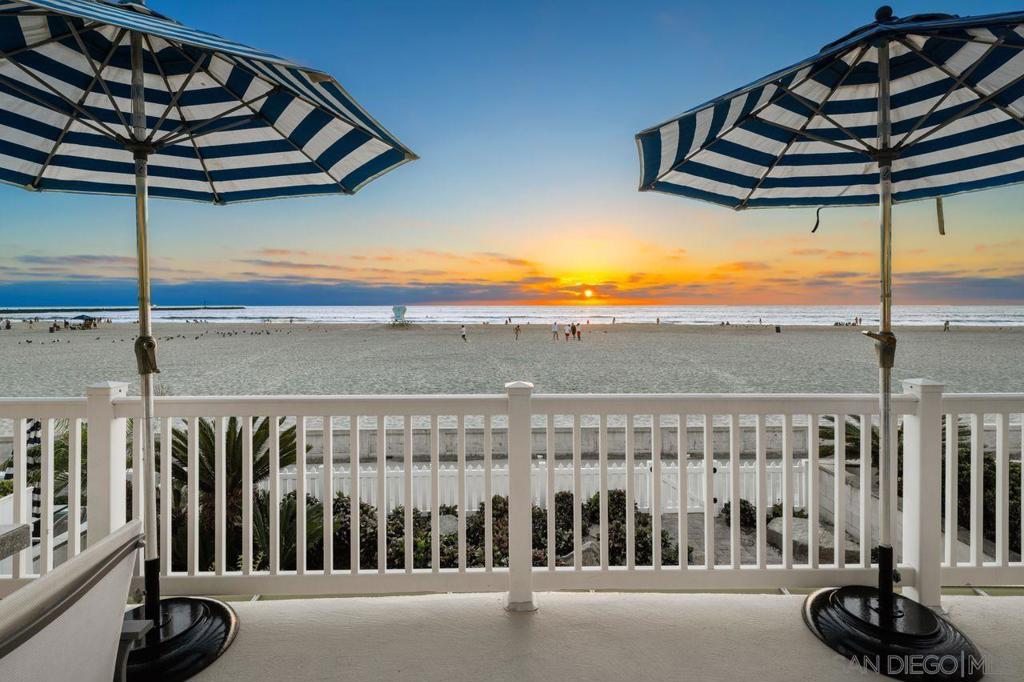 South Mission Beach meets Cape Cod elegance! This 4BD/4.5BA custom home offers unobstructed ocean, sand, and sunset views from every level. The main living area and primary suite each open through full walls of sliding glass doors to expansive ocean-facing decks, while a welcoming front patio provides additional outdoor space to relax or entertain. Inside, the open concept living room and dining area feature Hickory hardwood floors, wood beam ceilings, a brick fireplace, and hardwood accordion shutters flowing into a chef’s kitchen with imported German porcelain tile countertops, a walk-in pantry, and wet bar with a beverage fridge. The primary suite boasts a private ocean-view deck, wide plank hardwood floors, a walk-in closet, and a spa-inspired bath with soaking tub, dual vanities, and separate shower. Two additional en-suite bedrooms and a downstairs oceanfront patio framed by sea lavender, sago, and pygmy palms complete the thoughtful design. A 2-car side-by-side garage with guest parking and central air ensure comfort and convenience. Perfectly positioned between the Jetty and Roller Coaster, this home offers direct (not angled) ocean views with the boardwalk, cafés, and beach just moments away. Where South Mission Beach charm meets Cape Cod elegance, this 4BD/4.5BA custom home blends timeless design, modern comfort, and one of San Diego’s most coveted oceanfront locations. From the moment you step inside, you’re surrounded by unobstructed ocean, sand, and sunset views from every level. The main living area opens through a full wall of sliding glass doors to an expansive ocean-facing deck, creating seamless indoor-outdoor living. Upstairs, the primary suite offers its own private deck with breathtaking views, wide plank hardwood floors, a walk-in closet, and a spa-inspired bath featuring a soaking tub, dual vanities, and separate shower. The open-concept living room showcases Hickory hardwood floors, wood beam ceilings, a brick fireplace, and hardwood accordion shutters, all flowing into a chef’s kitchen adorned with imported German porcelain tile countertops, a walk-in pantry, wet bar with beverage fridge, and custom cabinetry — perfect for entertaining or quiet evenings at home. Two additional en-suite bedrooms and a downstairs oceanfront patio framed by sea lavender, sago, and pygmy palms complete the home’s thoughtful layout. A 2-car side-by-side garage with guest parking provides convenience, while central air ensures year-round comfort. Perfectly positioned between the Jetty and Roller Coaster, this home offers direct (not angled) ocean views with the boardwalk, cafés, and Mission Beach’s vibrant lifestyle just steps away.