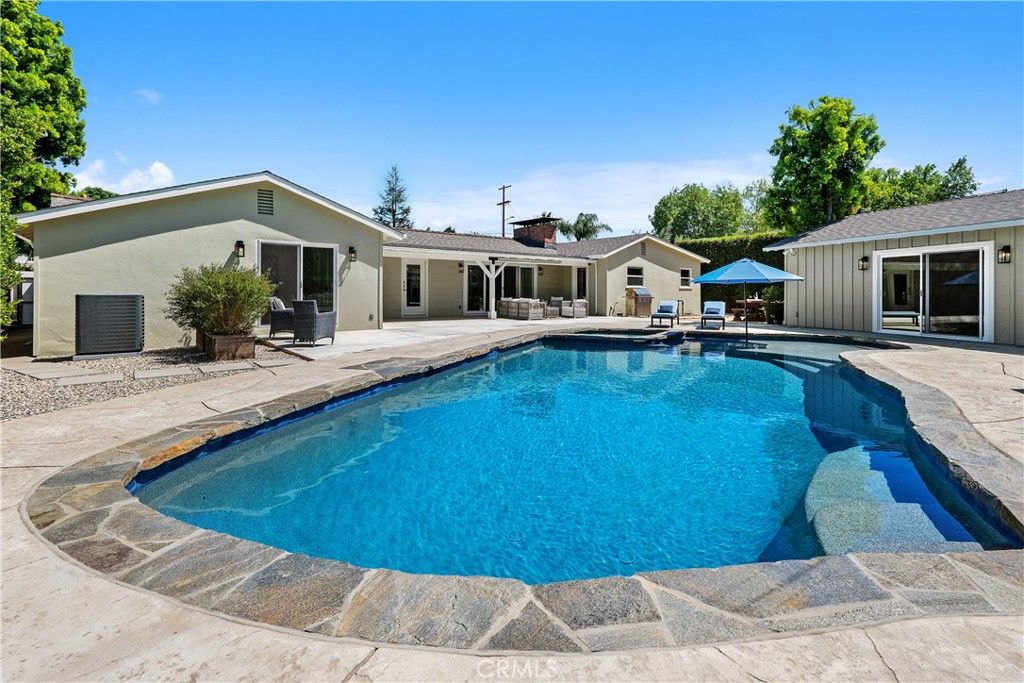 Photo of 5823 Lubao Avenue, Woodland Hills, CA 91367 (MLS # SR26075220)