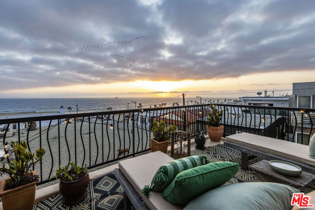 Your Coastal Dream Awaits! Imagine waking up to the sound of the waves and enjoying breathtaking sunset views from your own Manhattan Beach home. Located in the highly sought-after Sand Section (El Porto), this Pat Killen-designed residence is a stone's throw from the beach and the vibrant local scene. The top floor is an entertainer's delight, with an open-concept living room (featuring a fireplace) and a chef's kitchen with stainless steel appliances all showcasing magnificent ocean vistas. Step out onto the patio deck and soak it all in! The middle level provides a tranquil primary retreat with a private ocean-view patio, plus a versatile second bedroom/office with an ensuite bath. A ground-floor bedroom with a private entrance and full bath offers flexibility for guests or extended family. Includes a 2-car garage. Start living the Manhattan Beach lifestyle!