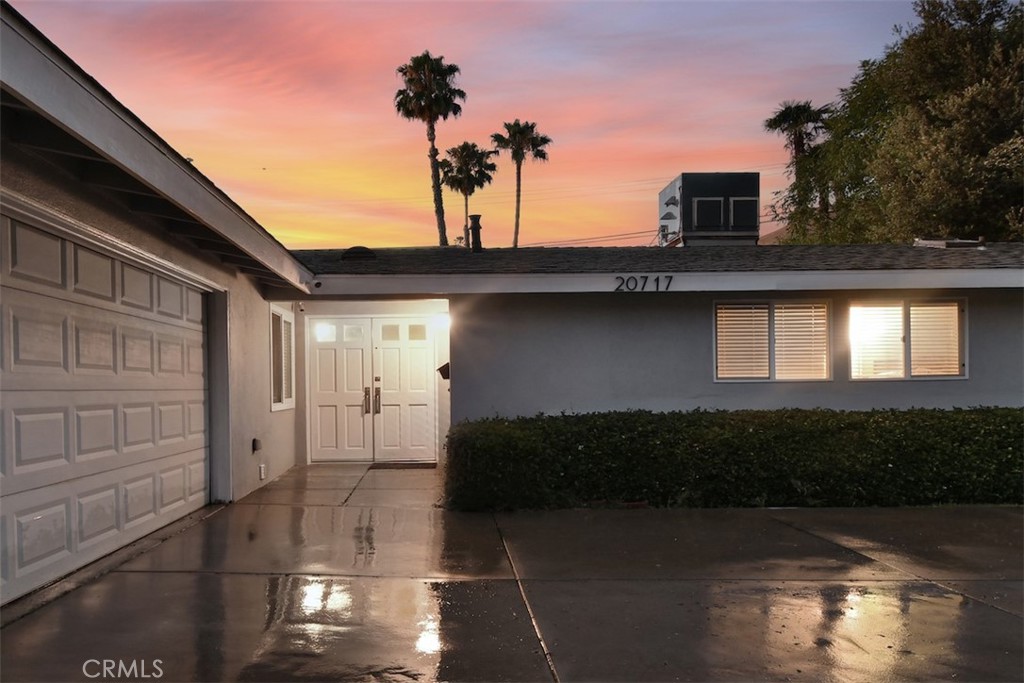 Welcome to 20717 Burbank Blvd. located in the pleasant, rolling hills of Carlton Terrace. This classic 3-bed, 2-bath one-story Mid Century modern home is move in perfect. The home boasts gorgeous hardwood floors, vaulted ceilings & skylights that add light and volume. Flowing seamlessly, chef’s kitchen with gas oven & range, open concept family room plus combo living & dining room with new French doors, create excellent space for entertaining many. The primary suite features hardwood floors, a large walk-in closet, and an en-suite bathroom. You will walk through the newly installed French doors to a beautiful (and low maintenance) patio and backyard that includes a recently built wood-burning firepit and peaceful views of the rolling hills and palm trees of Carlton Terrace. The very private backyard is surrounded by a 6-foot, white vinyl fence that is less than 3 years old. It's an ideal setting for anyone who enjoys hosting and entertaining. Elegant tile & LED lighting accent the custom designed uniquely shaped swimming pool and firepit. A magenta bougainvillea, colorful roses & orange trees add accents of color. HVAC is 1 year new. Extras include fireplace, tankless water heater, newly added dual pane windows, & a 2 car garage w/ long driveway for extra parking. Burbank Blvd is not a thoroughfare in this section of Woodland Hills; It is a quiet residential street. Carlton Terrace is located on the east side of Woodland Hills. The home is less than a mile from the 101 and Ventura Boulevard and close to shopping malls, great restaurants, and all the other leisure and entertainment options the West Valley offers.