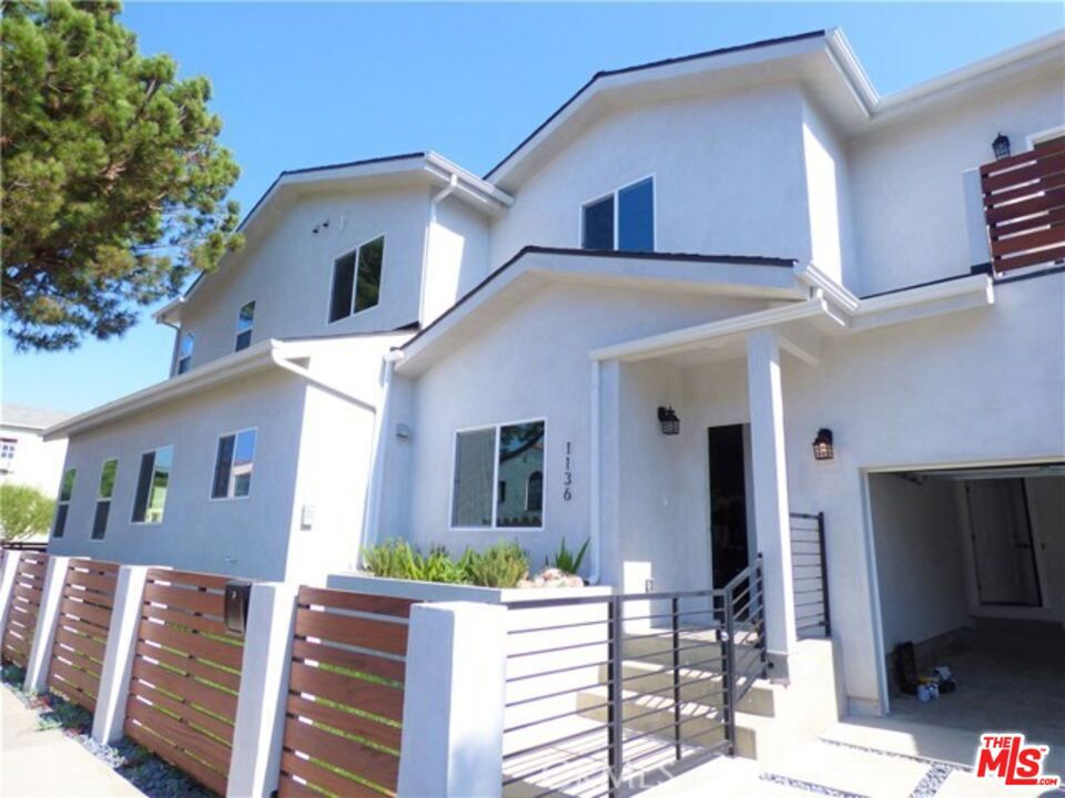 Built in 2017, this home looks and feels brand new! This beautiful 4-bedroom, 4-bathroom unit is part of a 2-unit apartment complex. The property features in-unit laundry, a spacious attached garage with side-by-side parking for 2 cars, plus 2 additional parking spaces inside the gate. The kitchen includes stainless steel appliances and stone countertops. The unit also offers a private backyard with a barbecue area, giving it the feel of a single-family home. The master bedroom includes a sizable balcony.Located between Beverly Hills and Downtown LA, the property is close to Koreatown and The Grove, surrounded by trendy K-culture retail shops, malls, and restaurants.