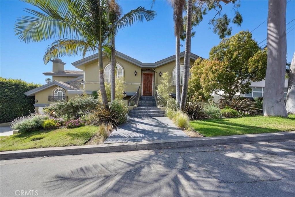 Discover the ultimate coastal luxury in this beautiful 4,774 sq. ft. home on a triple lot, perched in the prestigious Hill Section of Manhattan Beach.
With breathtaking panoramic ocean views stretching from Palos Verdes to Malibu, this extensively renovated property offers the perfect blend of elegance, space, relaxation and privacy. Designed for seamless indoor/outdoor living, the open floor plan offers abundant natural light, accentuated with high beam ceilings throughout. The upper floor offers incredible high sweeping ocean views from the great room, dining room and formal living room, all opening onto an immense 60’ long deck where you can enjoy unparalleled and unobstructed sunsets. The kitchen is spacious, well-appointed and features a Trompe L'oeil sky ceiling, while the island and breakfast nook seating offer casual dining options.
The large family room on the lower level opens on to the downstairs deck and an expansive backyard. The resort-style layout is an entertainer’s dream, featuring a pool and jacuzzi spa, an elevated sitting area with a fire pit, a lush lawn and mature landscaping.
The primary suite and additional bedrooms are generously sized and elegantly designed. A large open office offers high ceilings and a private patio. The rec room is ideal for use as a gym or games area and features convenient storage cabinets. A four car garage with additional storage space completes the home. Located just minutes from world-class dining, boutique shopping, award-winning schools and pristine beaches, this home is in an ideal location from which to enjoy the best of Manhattan Beach.
Owner will paint secondary bedrooms to tenant's color option.
