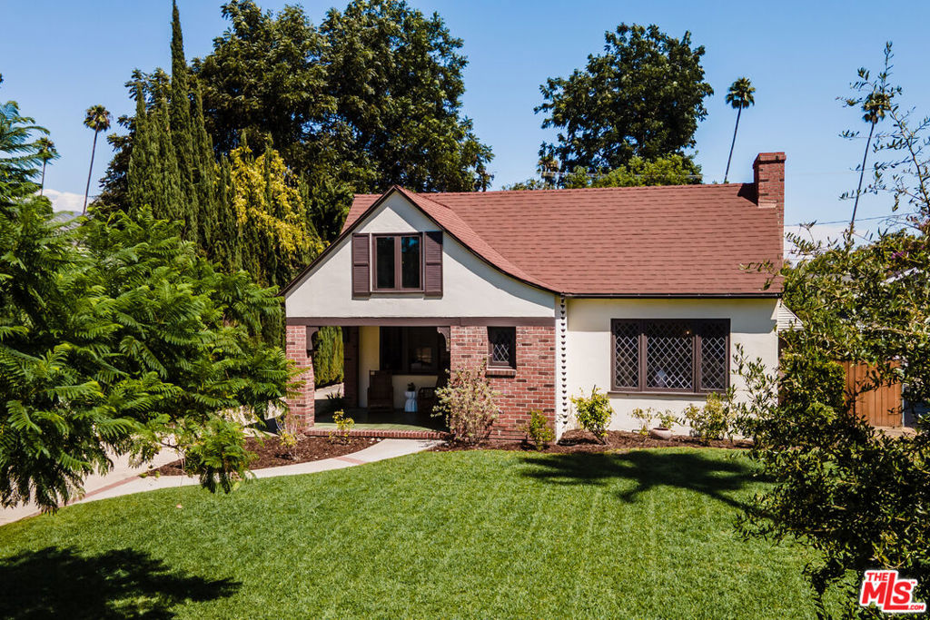 Welcome to 126 S San Marino. Built in 1932, this English Revival treasure carries the grace of another era while embracing the comforts of today. From the moment you arrive, you'll sense the timeless character that makes this home truly a special place where history and heart come together. Original beveled-glass windows catch the light, wood-beamed ceilings add warmth overhead, and every room is framed with thoughtful details: built-in cabinetry, ornate fixtures, and restored windows that speak to the craftsmanship of nearly a century ago. The home features a welcoming living room, a formal dining room, a breakfast room, two spacious bedrooms, a beautifully preserved full bath with original tile, a powder room, and 800+ sf of attic bonus space plus a California basement. Outdoors, the story continues. Beyond the inviting front lawn lie a backyard that feels like a private sanctuary and two additional distinct garden areas, creating a tapestry of greenery--perfect for afternoons with friends, quiet mornings with coffee, or evenings under the stars. The detached two-car garage with private patio offers even more possibilities, whether as a creative studio or future ADU. Modern comforts blend seamlessly with historic charm, including central heating and cooling for the entire home. Every space has been thoughtfully maintained and enhanced, creating a home that is as livable as it is beautiful. 126 S San Marino is more than a residence. It is a rare opportunity to own a piece of Pasadena's architectural history, ideally located just minutes from The Huntington Gardens, Cal Tech and the city's premier shopping, dining, and cultural attractions.
