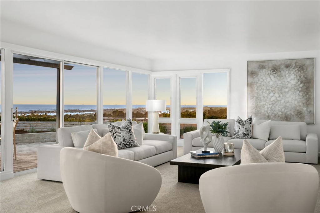 Nestled in the exclusive enclave of Broadmoor, Corona del Mar, this mid-century home is perched on one of the neighborhood’s most iconic lots. The property is designed as a single-level retreat, showcasing remarkable views of the Pacific Ocean, Catalina, Newport Center, and the iconic Newport Harbor on an expansive 14,300 SF lot. These vistas can be enjoyed from nearly every room, creating a serene backdrop for daily living. The home boasts four spacious bedrooms, each thoughtfully positioned to maximize views and comfort. Floor-to-ceiling windows and open-concept spaces invite abundant natural light and frame the picturesque surroundings. A timeless mid-century aesthetic with new paint and flooring extends effortlessly to outdoor spaces, where you can relax, entertain, or enjoy the coastal panorama. Balancing tranquility and proximity to Corona del Mar's finest dining, shopping, and beaches creates a lifestyle crafted for those who appreciate the finest Corona del Mar views and the allure of coastal living. Conceptual drawings from Sea Pointe Design & Remodel are available to illustrate a makeover of the existing structure.