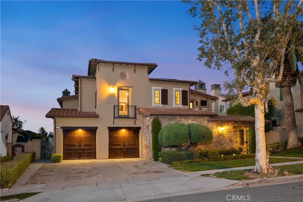 Presenting the largest SHOWCASE VIEW HOME in the sought-after Quail Hill community, nestled high in the coastal Laguna Coastal Hills, offering stunning views of city lights, canyons, rolling hills, and distant snow-capped mountains! The Former MODEL HOME “Vicara 4” sits on a PREMIUM, single-loaded lot