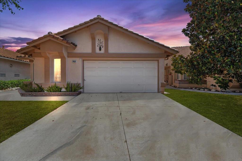 Come enjoy the vibrant 55+ lifestyle in Sun Lakes, where resort-style amenities and endless entertainment options await--right from the comfort of your well-maintained and upgraded Turnberry model home.This spacious 2-bedroom, 2-bath home with a versatile office/den has been meticulously cared for. The open-concept family and dining room features a cozy fireplace and direct access to a serene backyard patio--perfect for morning coffee or evening relaxation. The galley-style kitchen offers a cozy dining nook and an additional access point to the backyard, creating a seamless indoor-outdoor flow.The generous primary suite includes its own private patio access, a walk-in closet, and an en-suite bath with dual sinks. The 2-car garage includes an extended nook ideal for a golf cart, abundant built-in storage cabinets, and even a pull-down ladder leading to a large attic space.Step outside and enjoy peaceful mornings or sunny afternoons on your garden patio.Sun Lakes offers an unmatched lifestyle:- Two golf courses- Fitness centers- Indoor and outdoor pools- 80+ social clubs